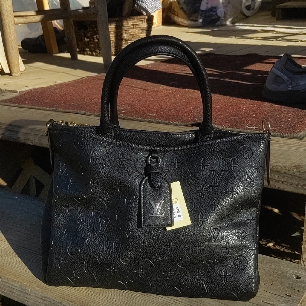Louis Vuitton Black Embossed Leather Handbag